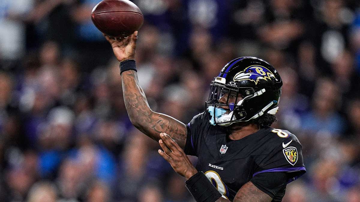 Baltimore Ravens quarterback Lamar Jackson (8) makes a pass against Detroit Lions during the second half.