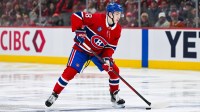 Montreal Canadiens defenseman Lane Hutson (48) considers his options with the puck against the Washington Capitals during the third period in game four of the first round of the 2025 Stanley Cup Playoffs at Bell Centre.
