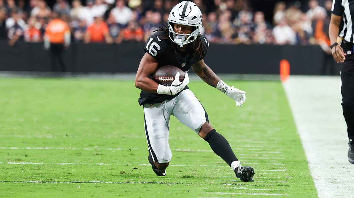 Las Vegas Raiders wide receiver Jakobi Meyers (16) runs the ball during the second half against the Chicago Bears at Allegiant Stadium.