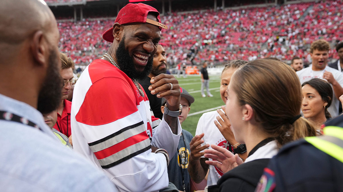 LeBron James talks to fans prior to the NCAA football game between the Ohio State Buckeyes and Notre Dame Fighting Irish at Ohio Stadium.