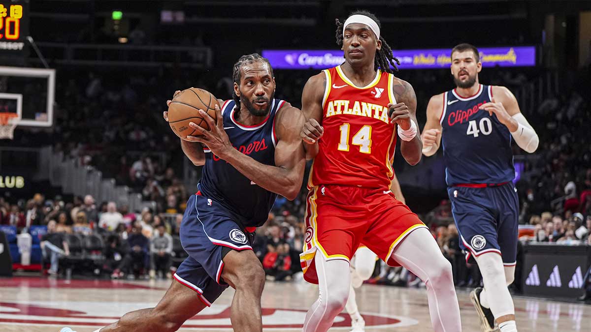 LA Clippers forward Kawhi Leonard (2) drives to the basket against Atlanta Hawks guard Terance Mann (14) during the second half at State Farm Arena.