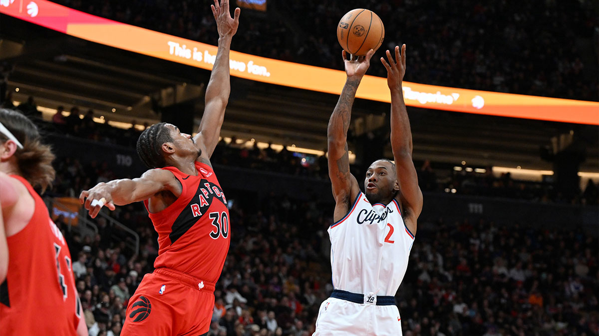 Los Angeles Clippers forward Kawhi Leonard (2) shoots the ball as Toronto Raptors guard Ochai Agbaji (30) defends in the second half at Scotiabank Arena.