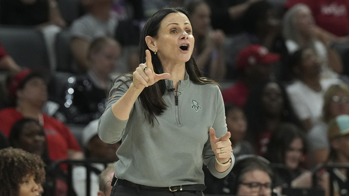 New York Liberty head coach Sandy Brondello gestures to her team during the third quarter of their game against the Las Vegas Aces at Michelob Ultra Arena.