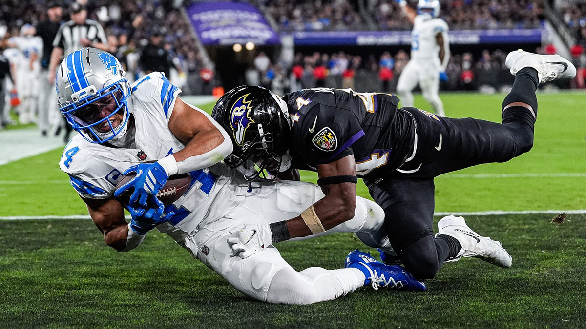 Detroit Lions wide receiver Amon-Ra St. Brown (14) makes a catch for a touchdown against Baltimore Ravens cornerback Marlon Humphrey (44) during the second half at M&T Bank Stadium in Baltimore, Md. on Monday, Sept. 22, 2025.