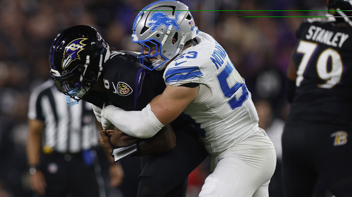 Detroit Lions linebacker Trevor Nowaske (53) tackles Baltimore Ravens quarterback Lamar Jackson (8) during the first half at M&T Bank Stadium.