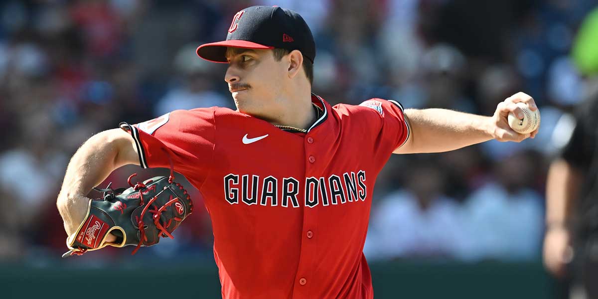 Cleveland Guardians starting pitcher Logan Allen (26) throws a pitch against the Texas Rangers during the first inning at Progressive Field.