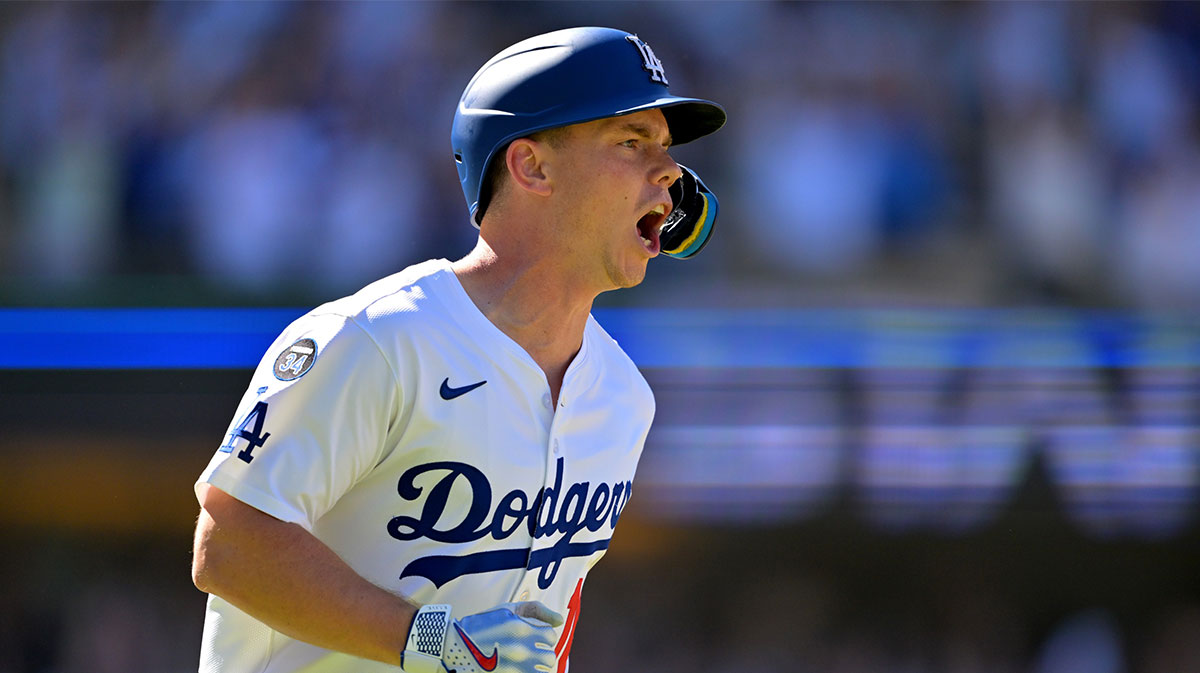Los Angeles Dodgers catcher Will Smith (16) celebrates as he rounds the bases on a walk-off home run in the ninth inning against the Arizona Diamondbacks at Dodger Stadium.