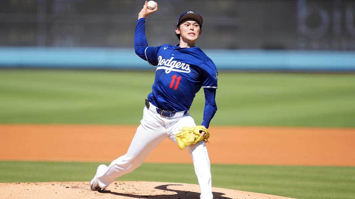 Los Angeles Dodgers pitcher Roki Sasaki (11) throws before the game against the Toronto Blue Jays at Dodger Stadium.