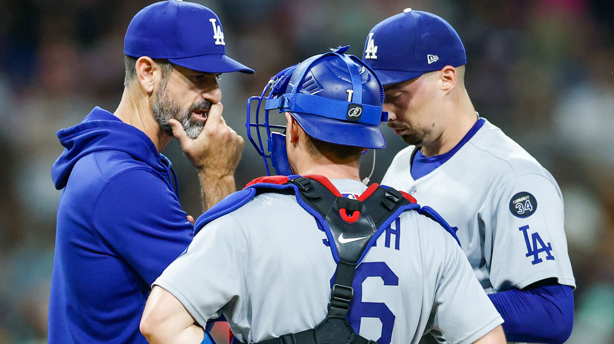 Los Angeles Dodgers pitching coach Mark Prior (99) visits the mound during the fourth inning against the San Diego Padres.