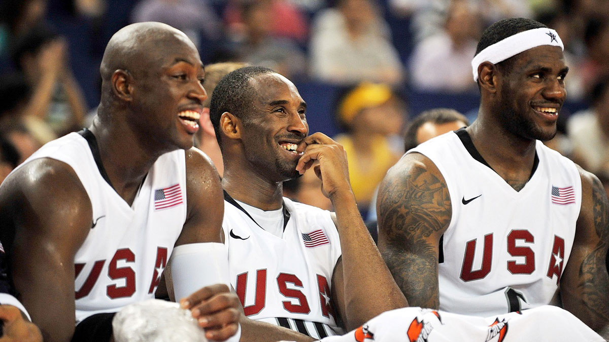 Dwyane Wade (USA) (left), Kobe Bryant (USA) (center) and LeBron James (USA) during a friendly game against Russia before the Olympic games in the Ghizong Tennis Center. The United States won 89-68.