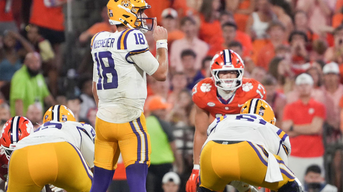 Louisiana State University quarterback Garrett Nussmeier (18) gets ready to run a play against Clemson during the third quarter at Memorial Stadium in Clemson, S.C.