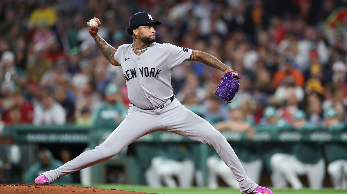 New York Yankees starting pitcher Luis Gil (81) delivers a pitch during the second inning against the Boston Red Sox at Fenway Park.