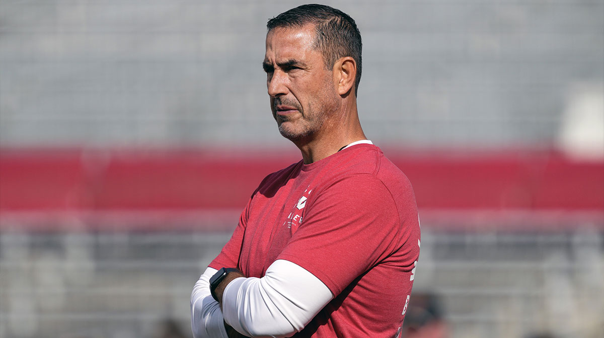 Wisconsin Badgers head coach Luke Fickell looks on during warm-ups prior to the game against the Maryland Terrapins at Camp Randall Stadium.