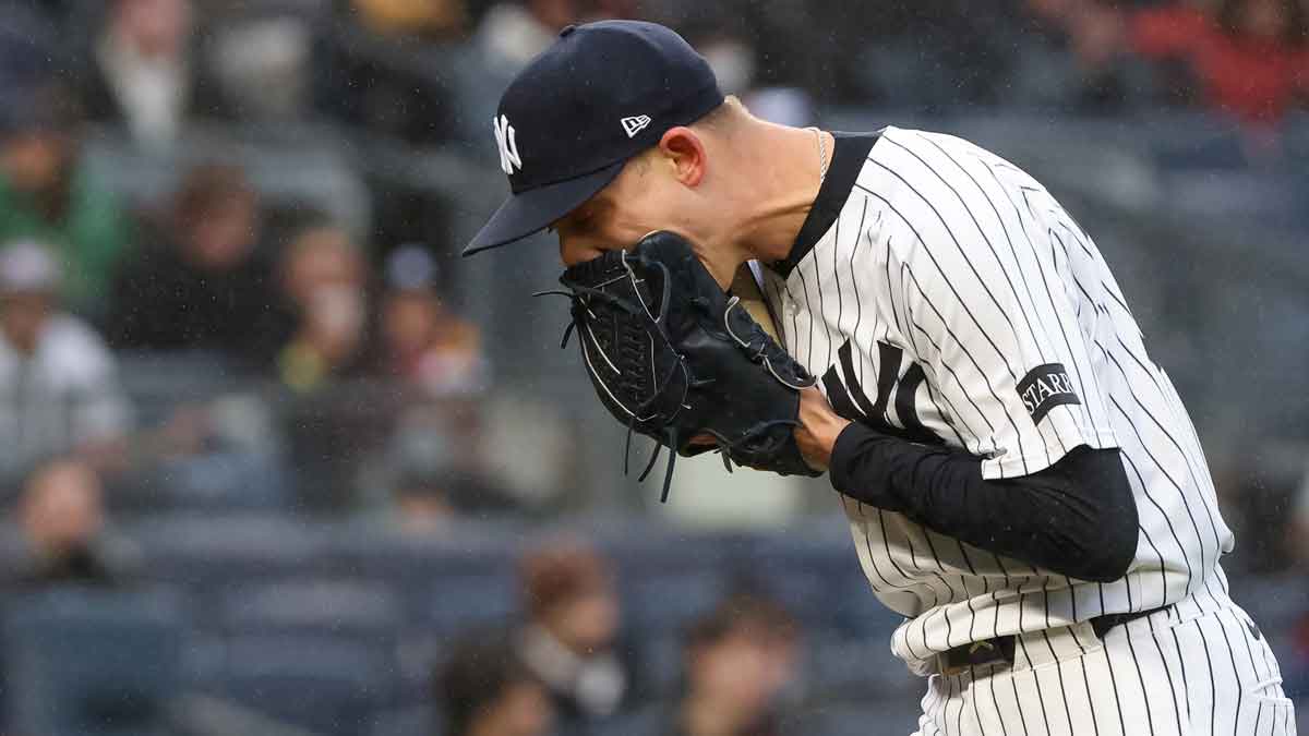 New York Yankees pitcher Luke Weaver (30) reacts after the third strike out against the San Francisco Giants during the seventh inning at Yankee Stadium.