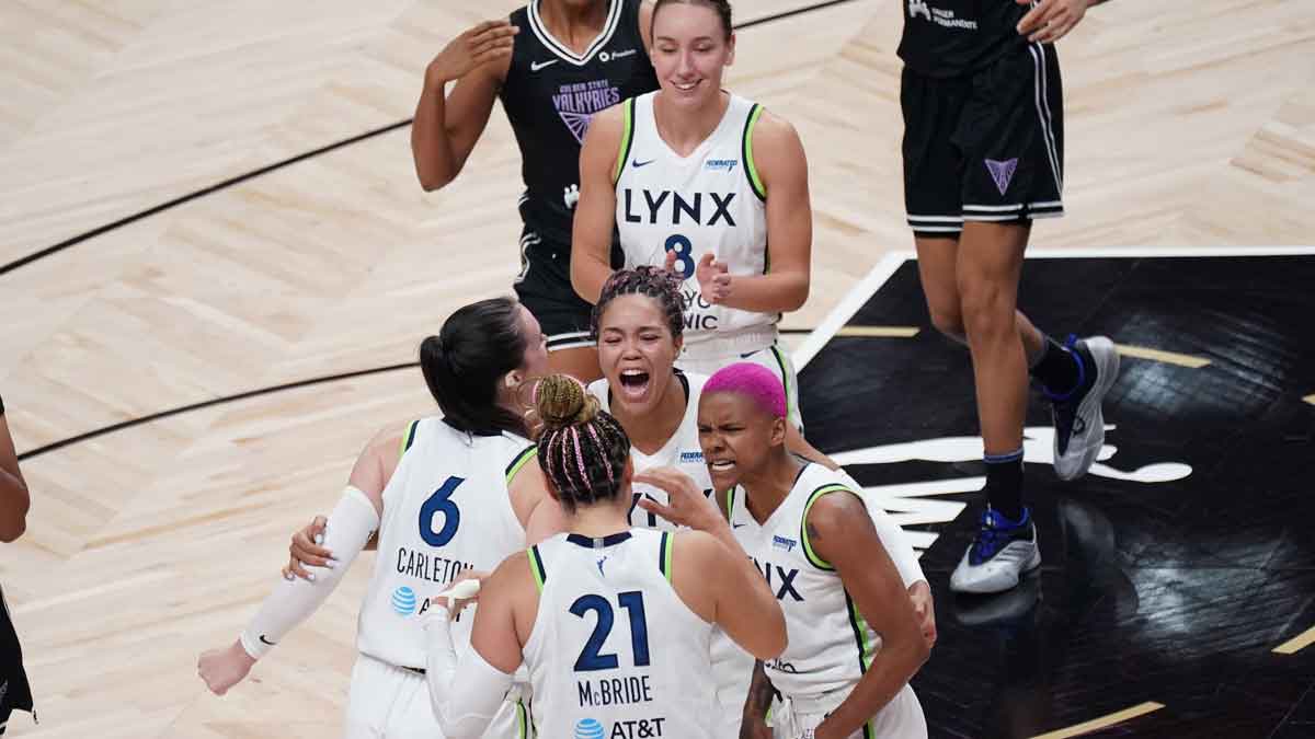 Minnesota Lynx forward Napheesa Collier (24), forward Bridget Carleton (6), guard Courtney Williams (10), guard Kayla McBride (21) and forward Alanna Smith (8) celebrate after defeating the Golden State Valkyries in game two of round one for the 2025 WNBA Playoffs at SAP Center.