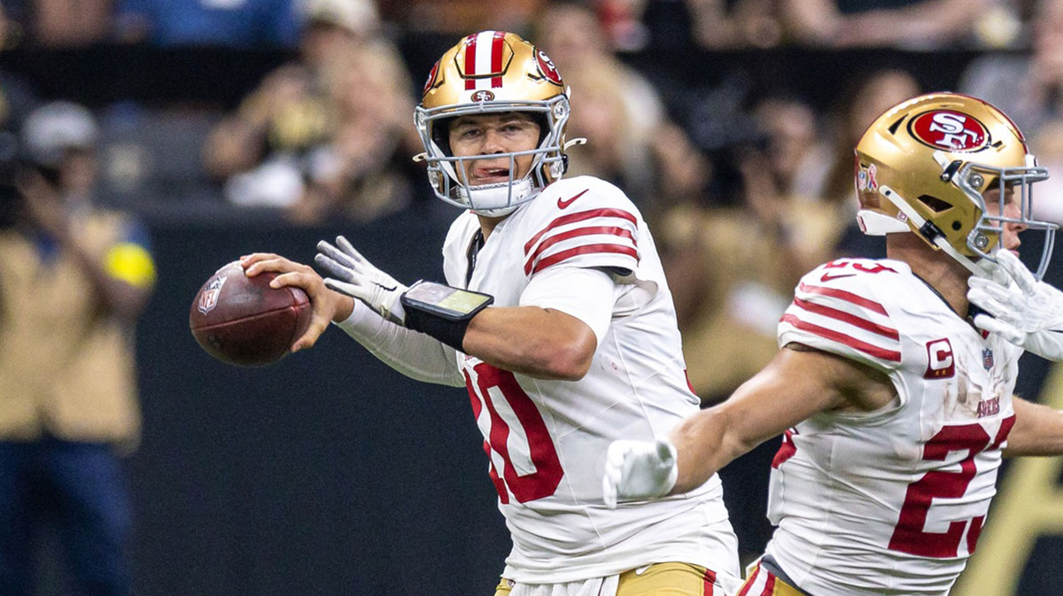 San Francisco 49ers quarterback Mac Jones (10) passes against the New Orleans Saints during the first half at Caesars Superdome.