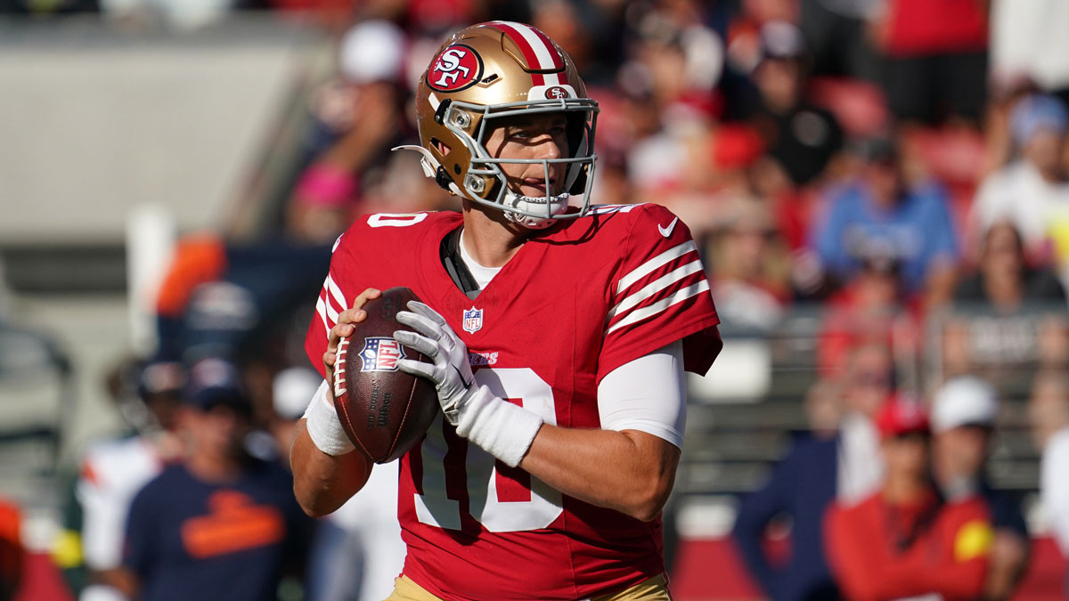 San Francisco 49ers quarterback Mac Jones (10) drops back to pass in the first quarter against the Denver Broncos at Levi's Stadium.