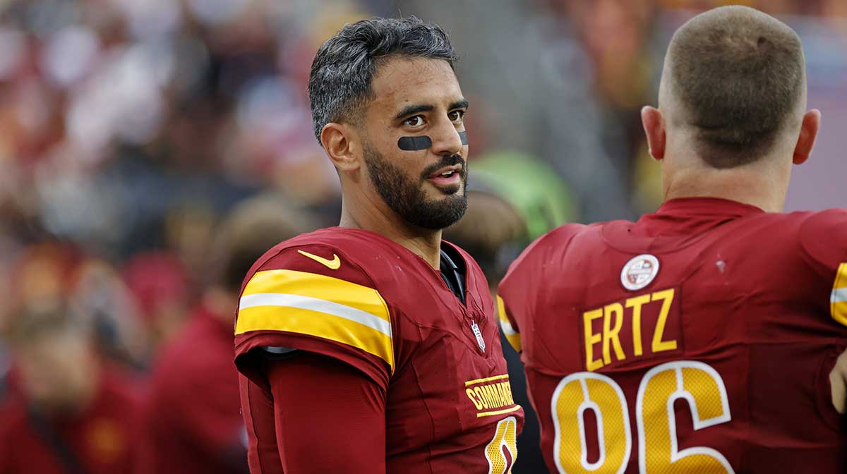 Commanders’ Marcus Mariota reacts to leaving Dan Quinn bloody on sideline