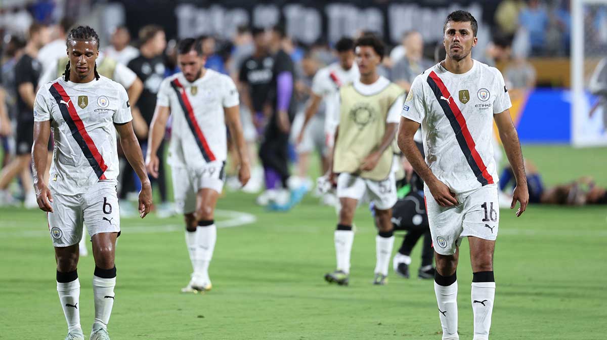 Manchester City defender Nathan Ake (6) and midfielder Rodri (16) react after losing to Al Hilal FC during a round of 16 match of the 2025 FIFA Club World Cup at Camping World Stadium.