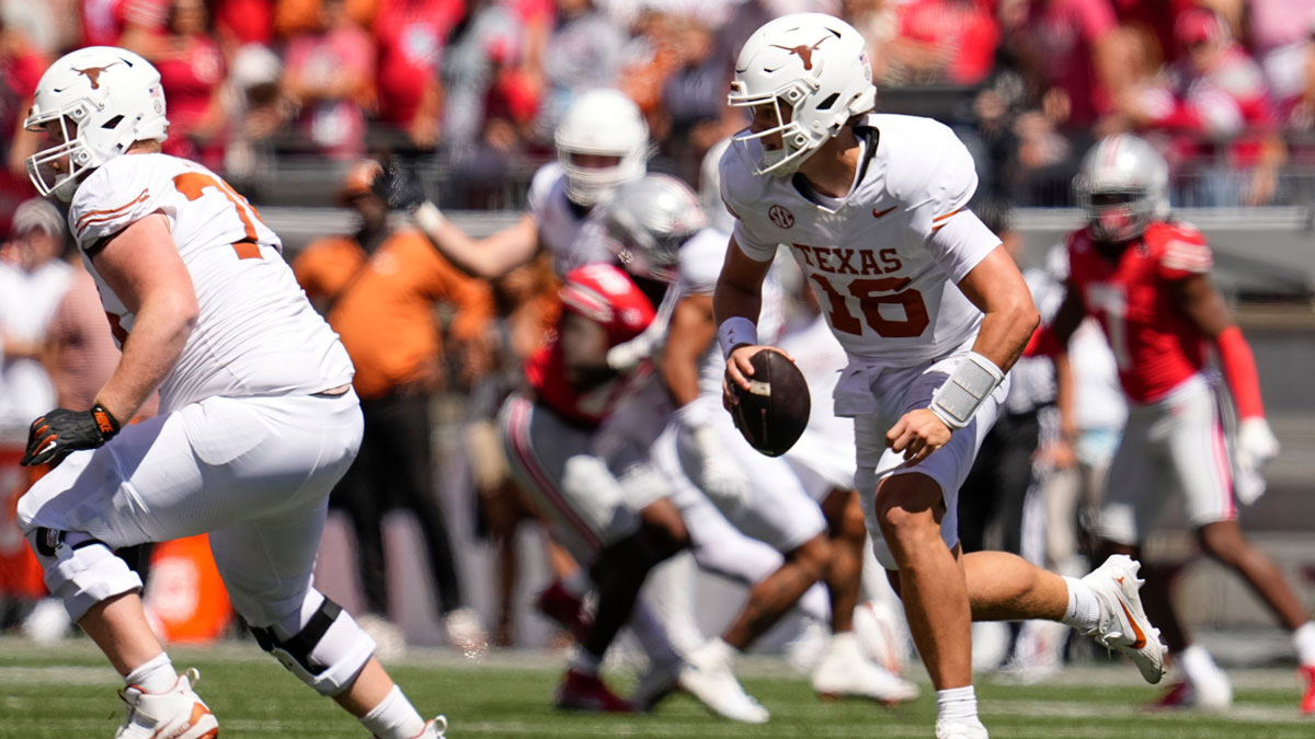 Texas Longhorns quarterback Arch Manning (16) runs during the second half of the NCAA football game against the Ohio State Buckeyes at Ohio Stadium on Aug. 30, 2025. Ohio State won 14-7.