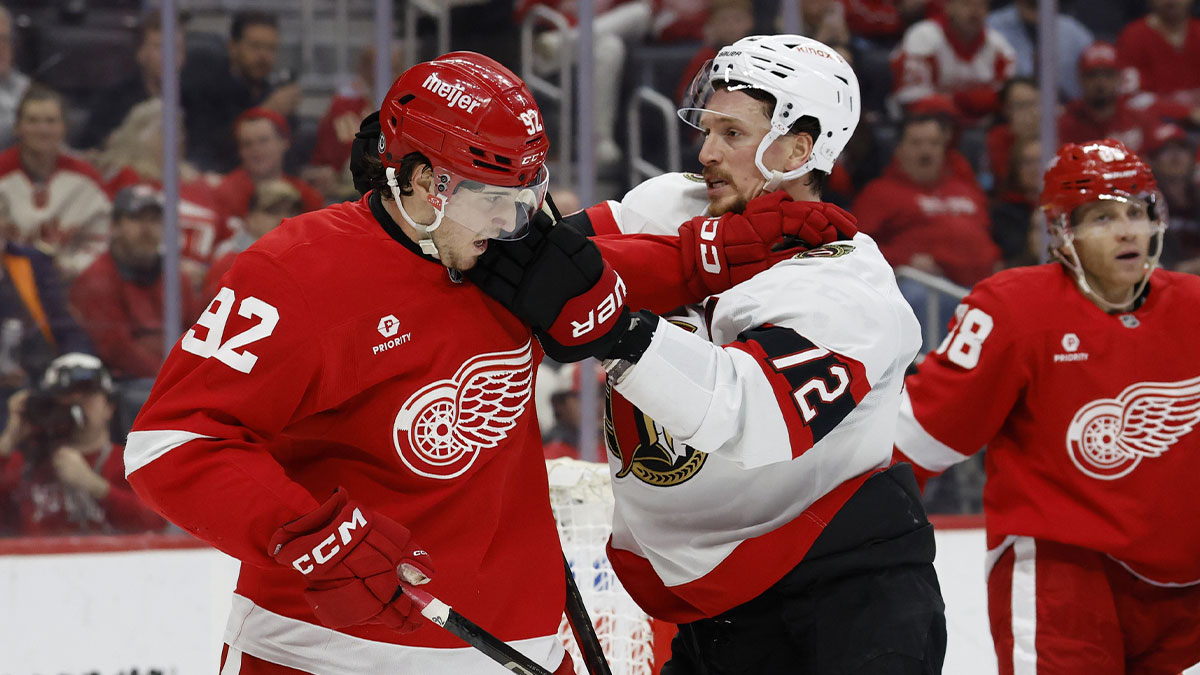 Detroit Red Wings center Marco Kasper (92) shoves Ottawa Senators defenseman Thomas Chabot (72) in the second period at Little Caesars Arena.