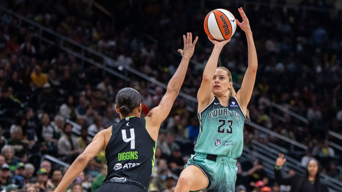 New York Liberty guard Marine Johannes (23) shoots the ball against Seattle Storm guard Skylar Diggins (4) during the first half at Climate Pledge Arena.