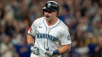 Seattle Mariners catcher Cal Raleigh (29) celebrates after hitting a solo home run during the eighth inning against the Colorado Rockies at T-Mobile Park.