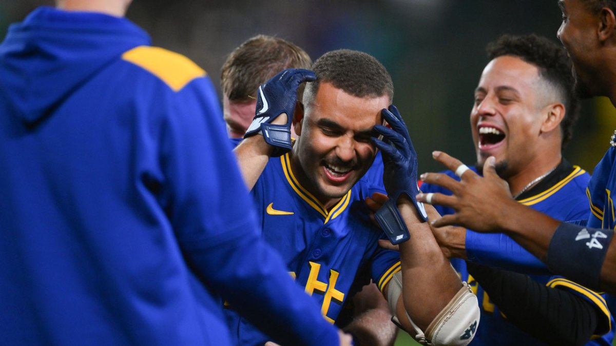 Mariners catcher Harry Ford (5) celebrates