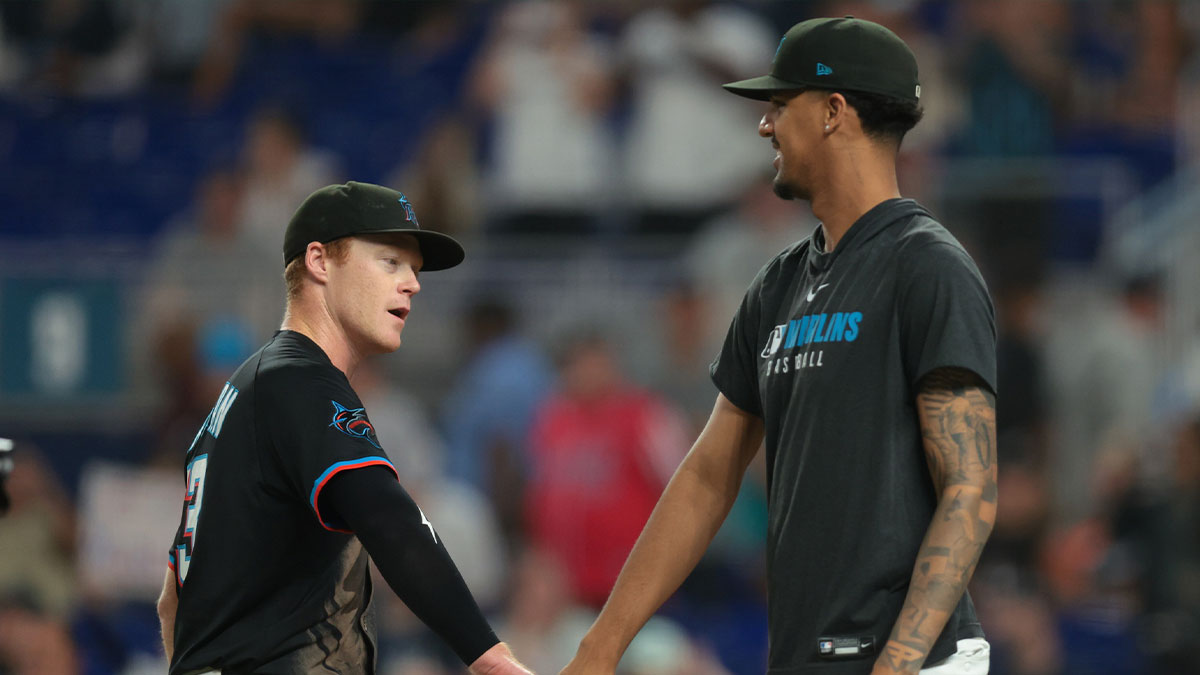 Miami Marlins first baseman Eric Wagaman (33) celebrates with starting pitcher Eury Perez (39) after the game against the Detroit Tigers at loanDepot Park.