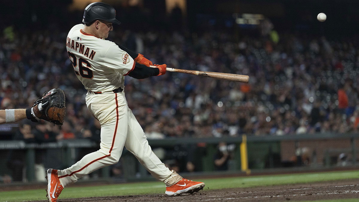 San Francisco Giants third base Matt Chapman (26) hits a solo home run during the seventh inning against the Chicago Cubs at Oracle Park.