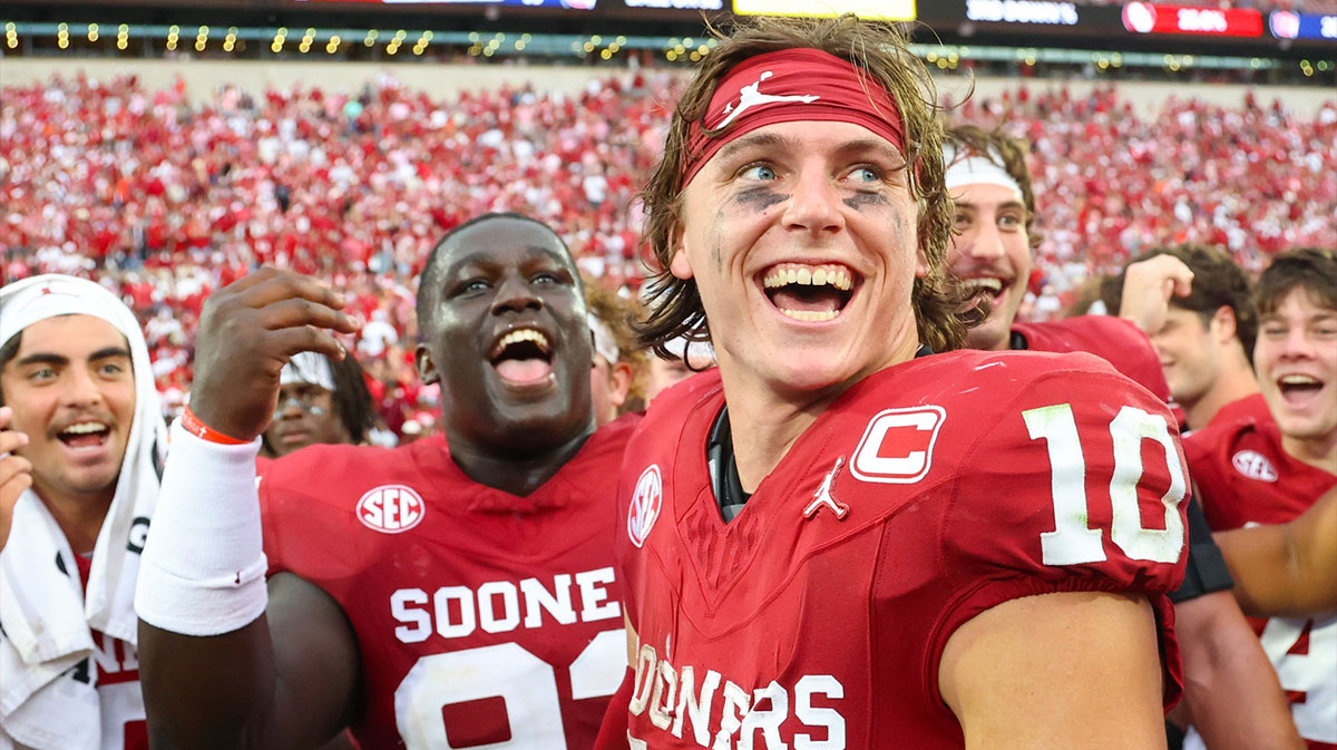 Oklahoma Sooners quarterback John Mateer (10) celebrates with teammates after the game against the Auburn Tigers at Gaylord Family-Oklahoma Memorial Stadium.