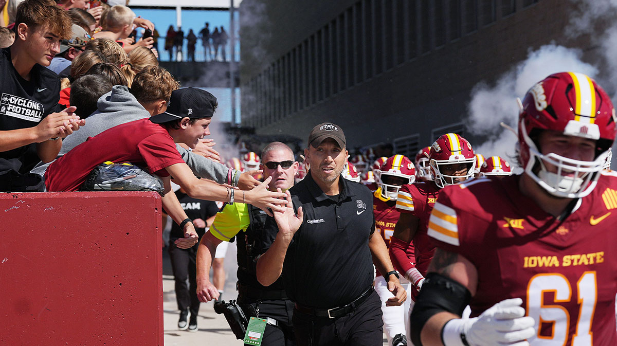 Iowa State Cyclones head coach Matt Campbell high-five fans as enter the field with the team before the game against Iowa in the Cy-Hawk football at Jack Trice Stadium on Sept. 6, 2025, in Ames, Iowa