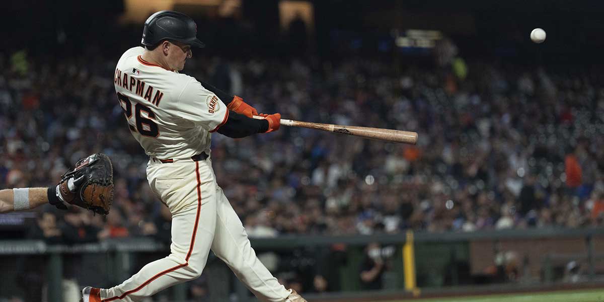 Aug 27, 2025; San Francisco, California, USA; San Francisco Giants third base Matt Chapman (26) hits a solo home run during the seventh inning against the Chicago Cubs at Oracle Park.