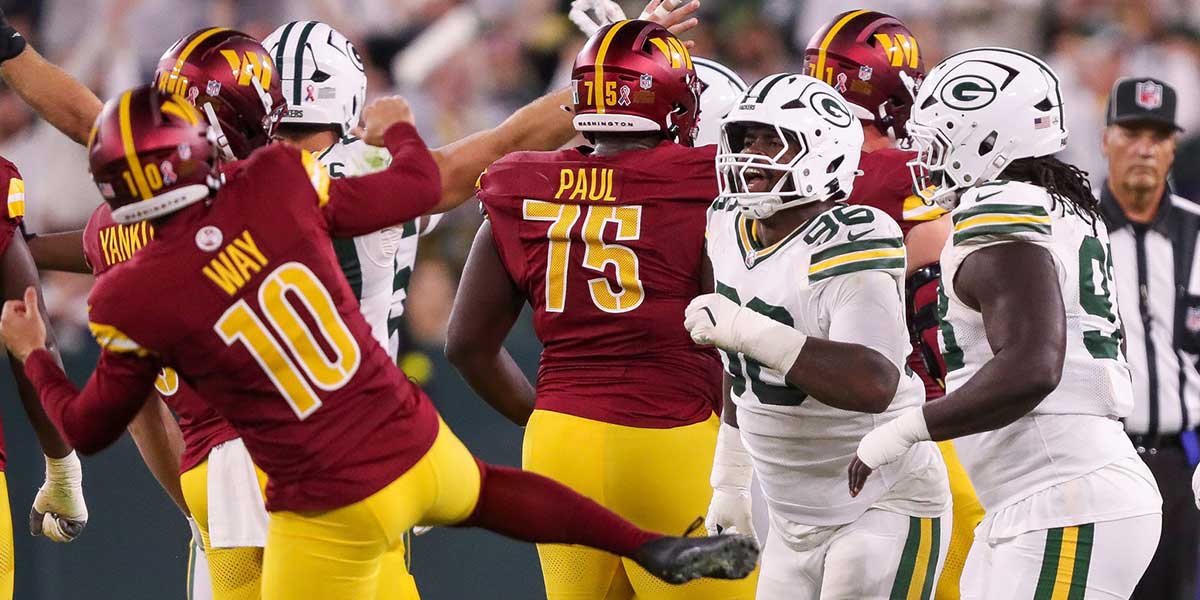 Green Bay Packers defensive tackle Devonte Wyatt (95) reacts after a missed field goal by Washington Commanders place kicker Matt Gay.