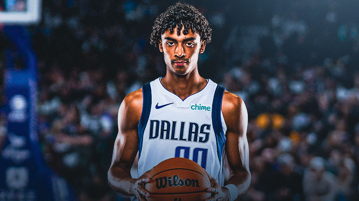Max Christie in the mavericks jersey with a basketball in his hands and his jersey number on the front.Mavericks player who will shock world with breakout 2025-26 season