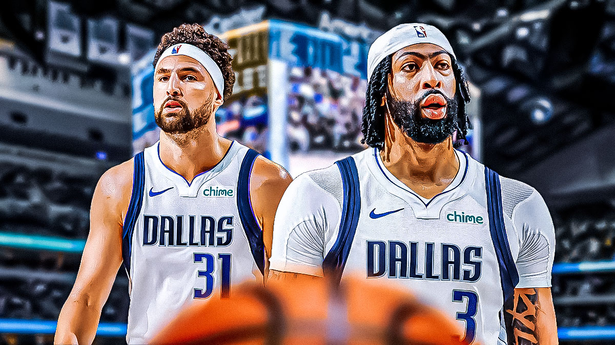 Mavericks Anthony Davis, Mavericks Klay Thompson both looking serious in front. In background, need the American Airlines Center.
