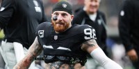 Las Vegas Raiders defensive end Maxx Crosby (98) warms up prior to the game against the Chicago Bears at Allegiant Stadium.