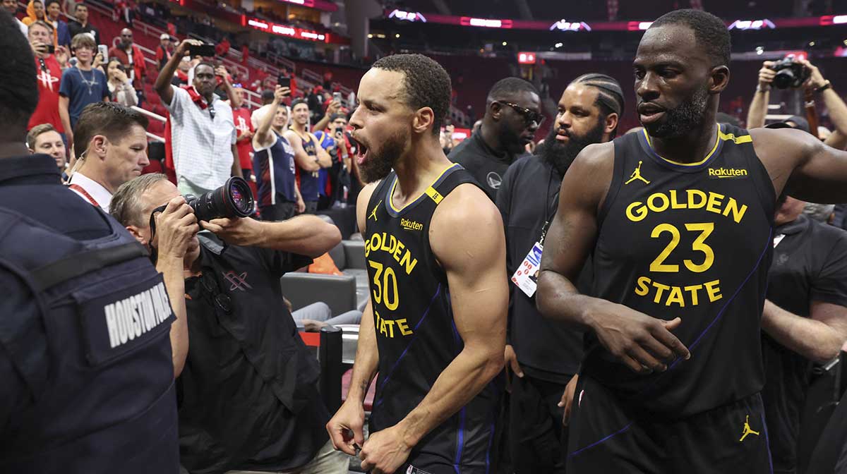 Golden State Warriors guard Stephen Curry (30) and forward Draymond Green (23) walk off the court after game seven of the first round for the 2025 NBA Playoffs against the Houston Rockets at Toyota Center. Mandatory Credit: Troy Taormina-Imagn Images