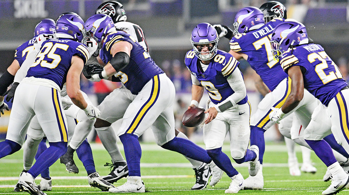 Minnesota Vikings quarterback J.J. McCarthy (9) runs the ball during the first half against the Atlanta Falcons at U.S. Bank Stadium.
