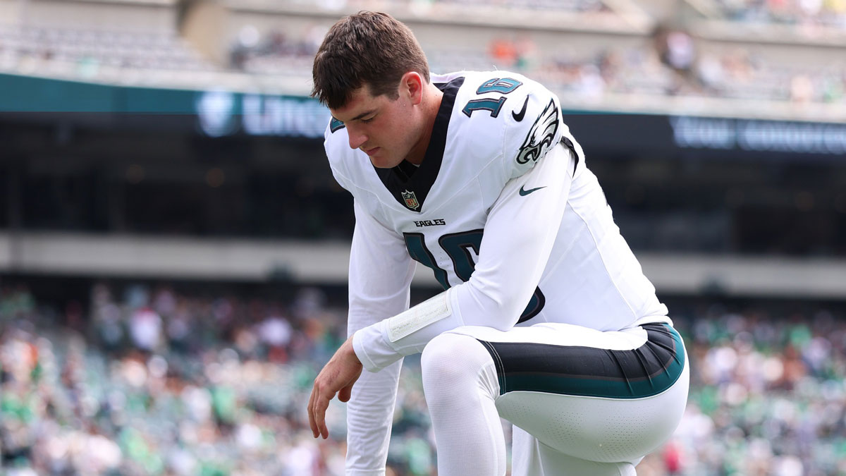 Philadelphia Eagles quarterback Tanner McKee (16) kneels on the field before a game against the Cleveland Browns at Lincoln Financial Field.