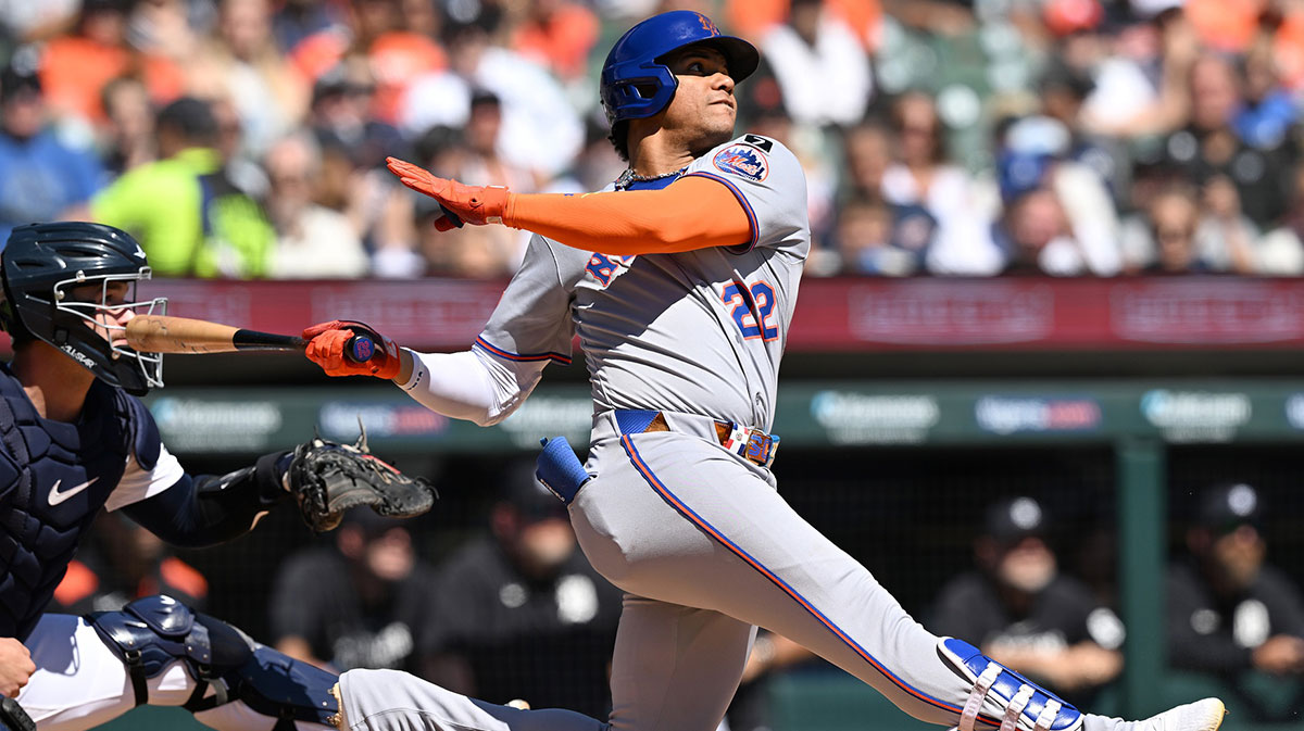 New York Mets right fielder Juan Soto (22) hits a grand slam home run against the Detroit Tigers in the fourth inning at Comerica Park.