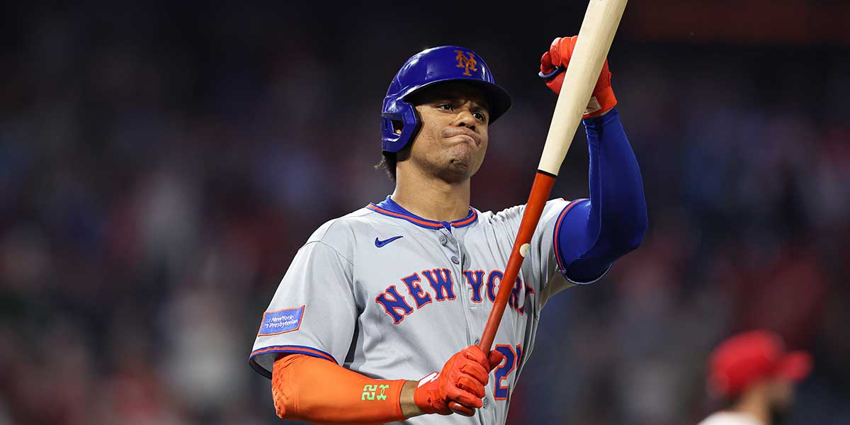 New York Mets outfielder Juan Soto (22) punches his bat after popping out to end the game in a loss against the Philadelphia Phillies at Citizens Bank Park.