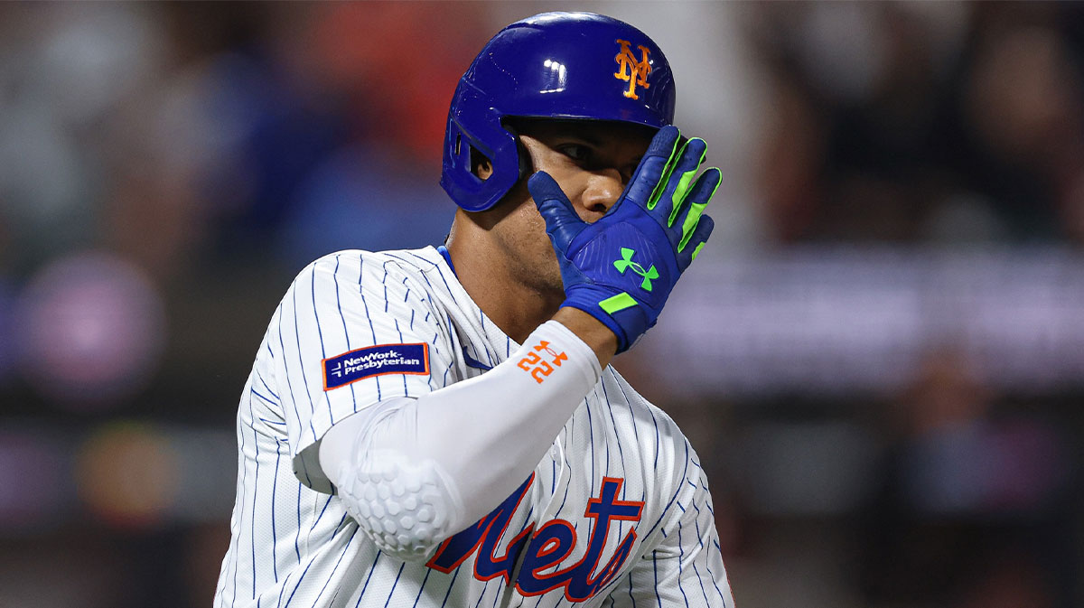 New York Mets right fielder Juan Soto (22) hits a home run during the fifth inning against the San Diego Padres at Citi Field.