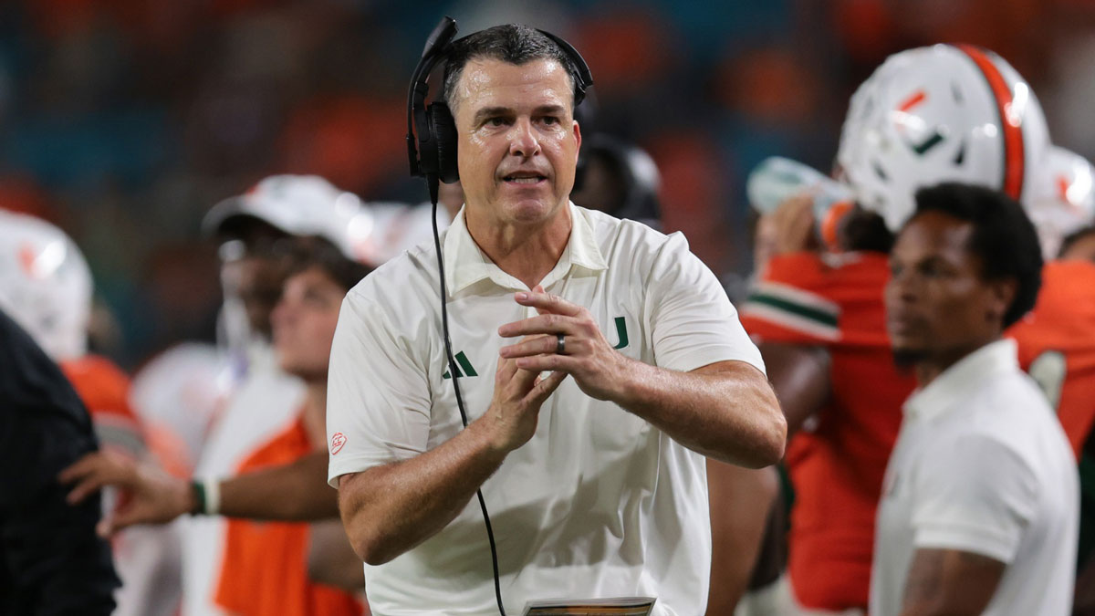 Miami Hurricanes head coach Mario Cristobal call a timeout against the South Florida Bulls during the fourth quarter at Hard Rock Stadium.