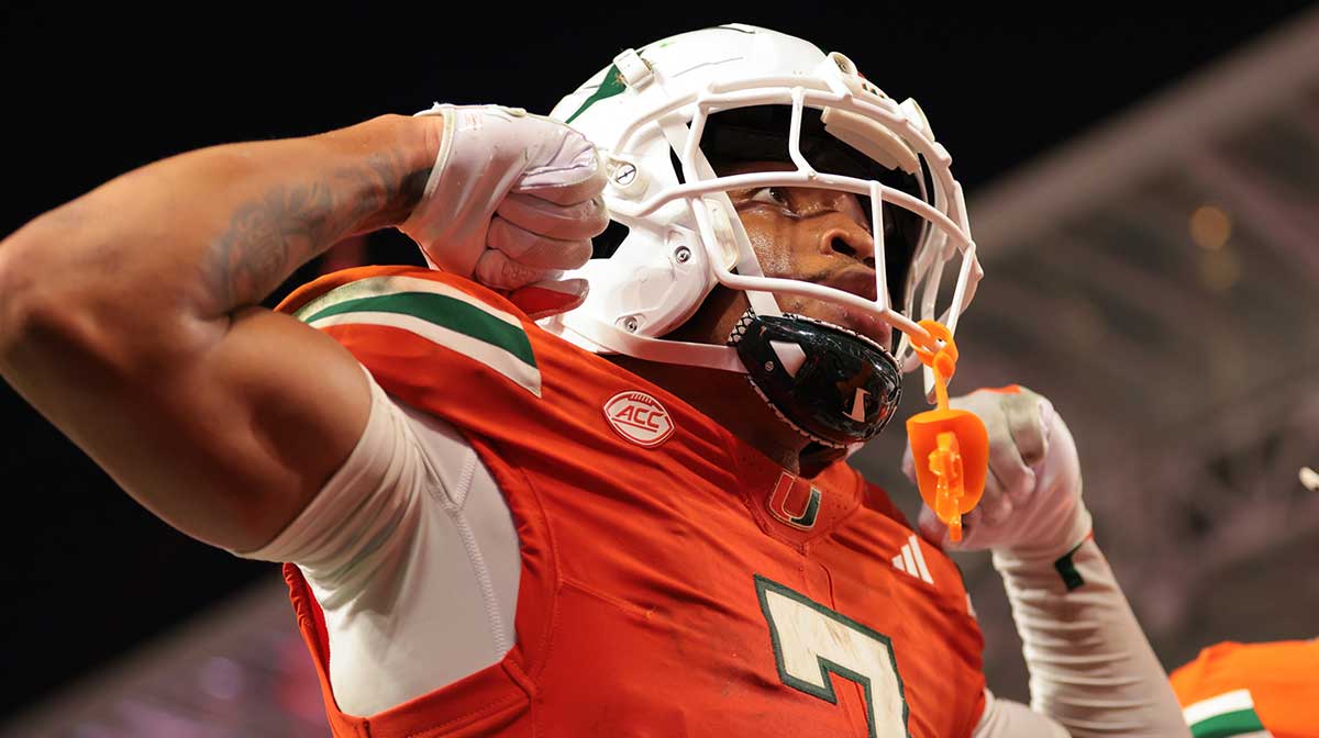 Miami Hurricanes wide receiver CJ Daniels (7) celebrates after scoring a touchdown against the Bethune-Cookman Wildcats during the second quarter at Hard Rock Stadium.
