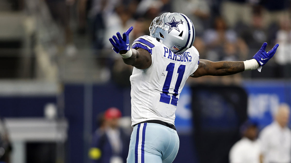 Dallas Cowboys linebacker Micah Parsons (11) reacts after making a sack in the third quarter against the Cincinnati Bengals at AT&T Stadium.
