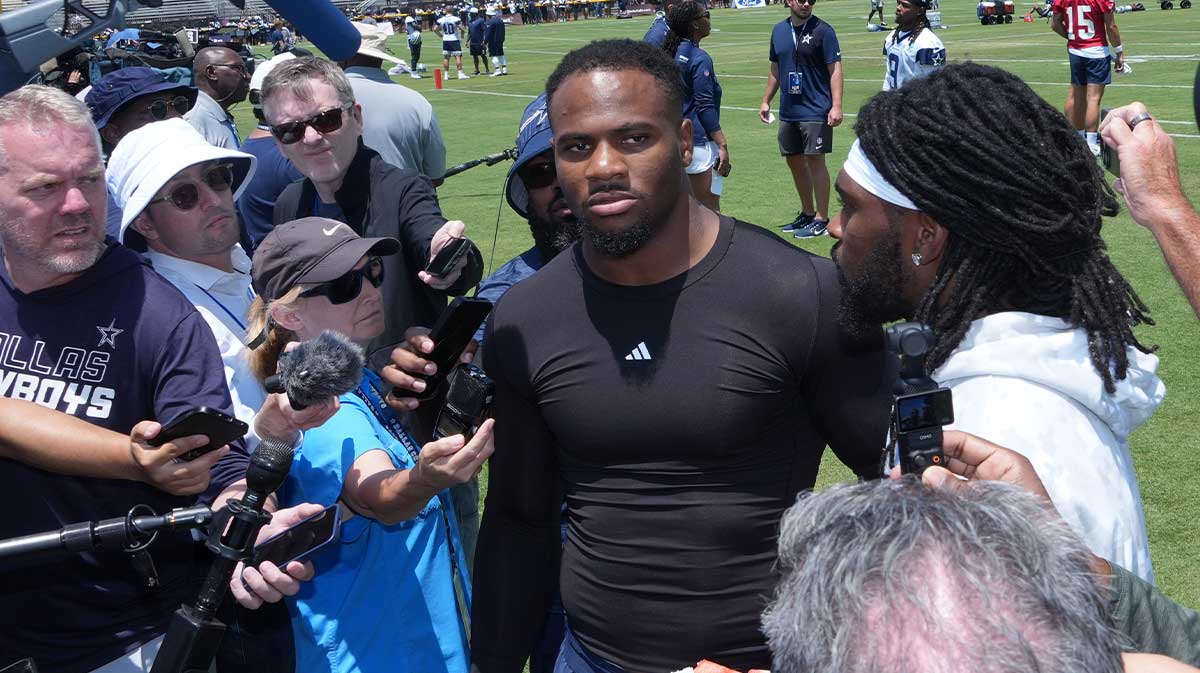Dallas Cowboys defensive end Micah Parsons (left) and cornerback Trevon Diggs talks to media during training camp