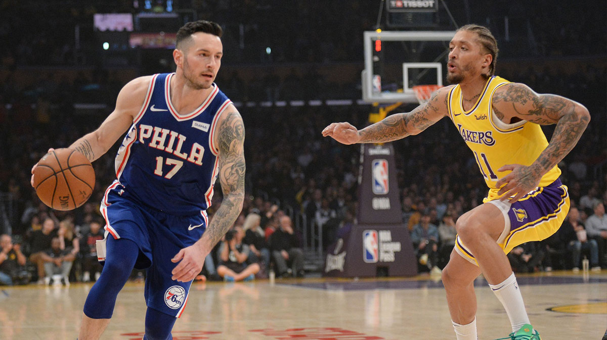 Philadelphia 76ers guard JJ Redick (17) moves the ball against Los Angeles Lakers forward Michael Beasley (11) during the first half at Staples Center.