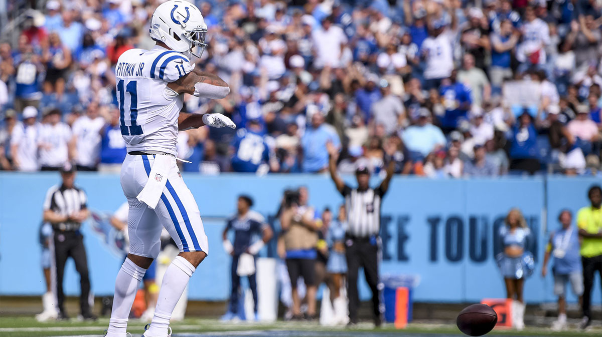 Indianapolis Colts wide receiver Michael Pittman (11) celebrates scoring a touchdown during the third quarter at Nissan Stadium.