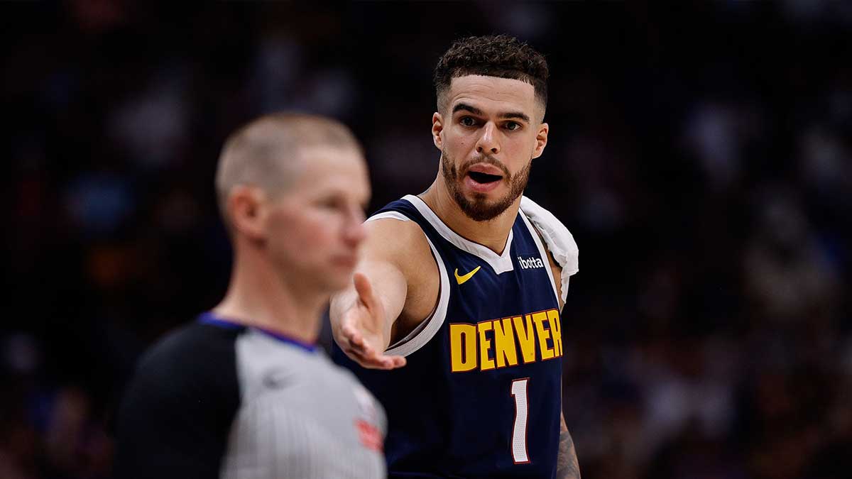 Denver Nuggets forward Michael Porter Jr. (1) gestures to referee Tyler Ford in the second quarter against the Oklahoma City Thunder during game four of the second round of the 2025 NBA Playoffs at Ball Arena.